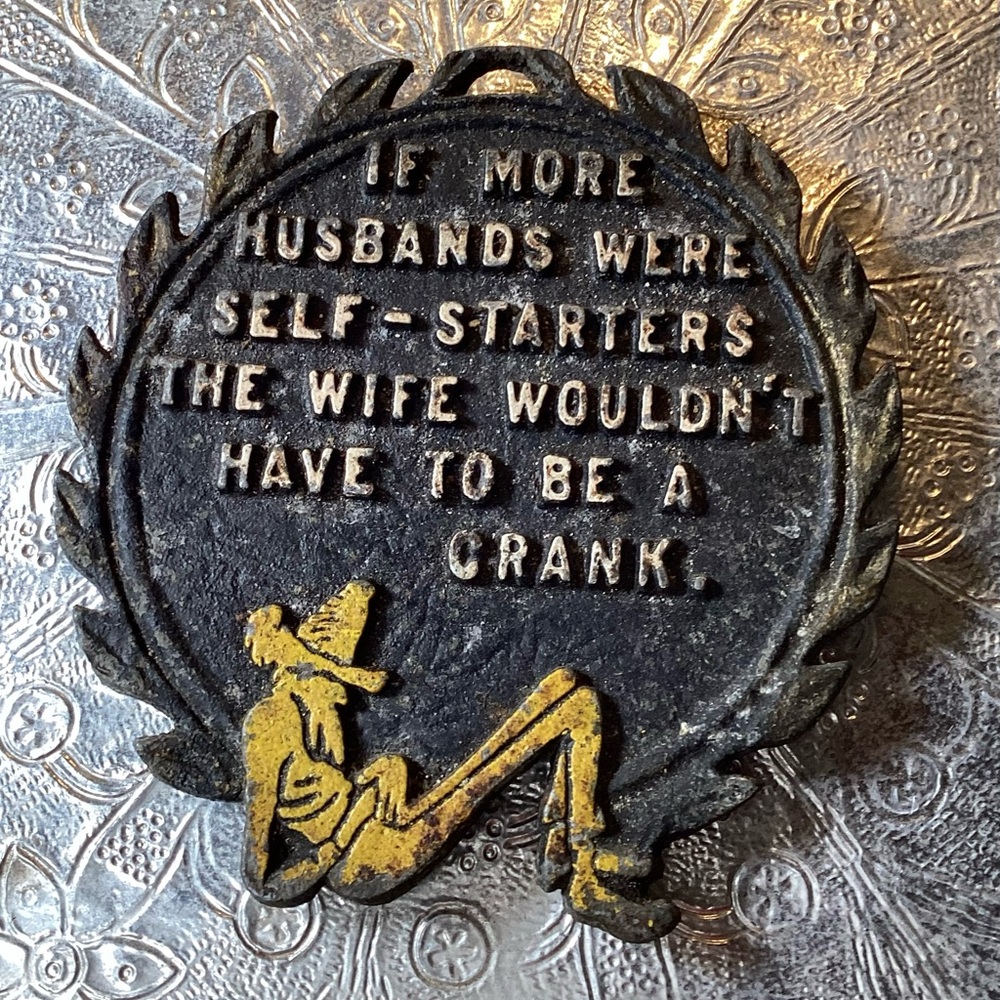 Vintage Cast Iron Trivet "If More Husbands Were Self-Starters The Wife…”
